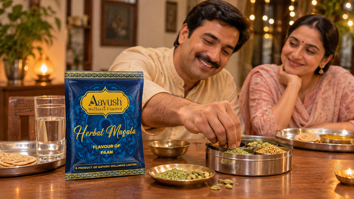 Indian couple choosing saunf and a supari-free Aayush Herbal Masala pouch after dinner at home